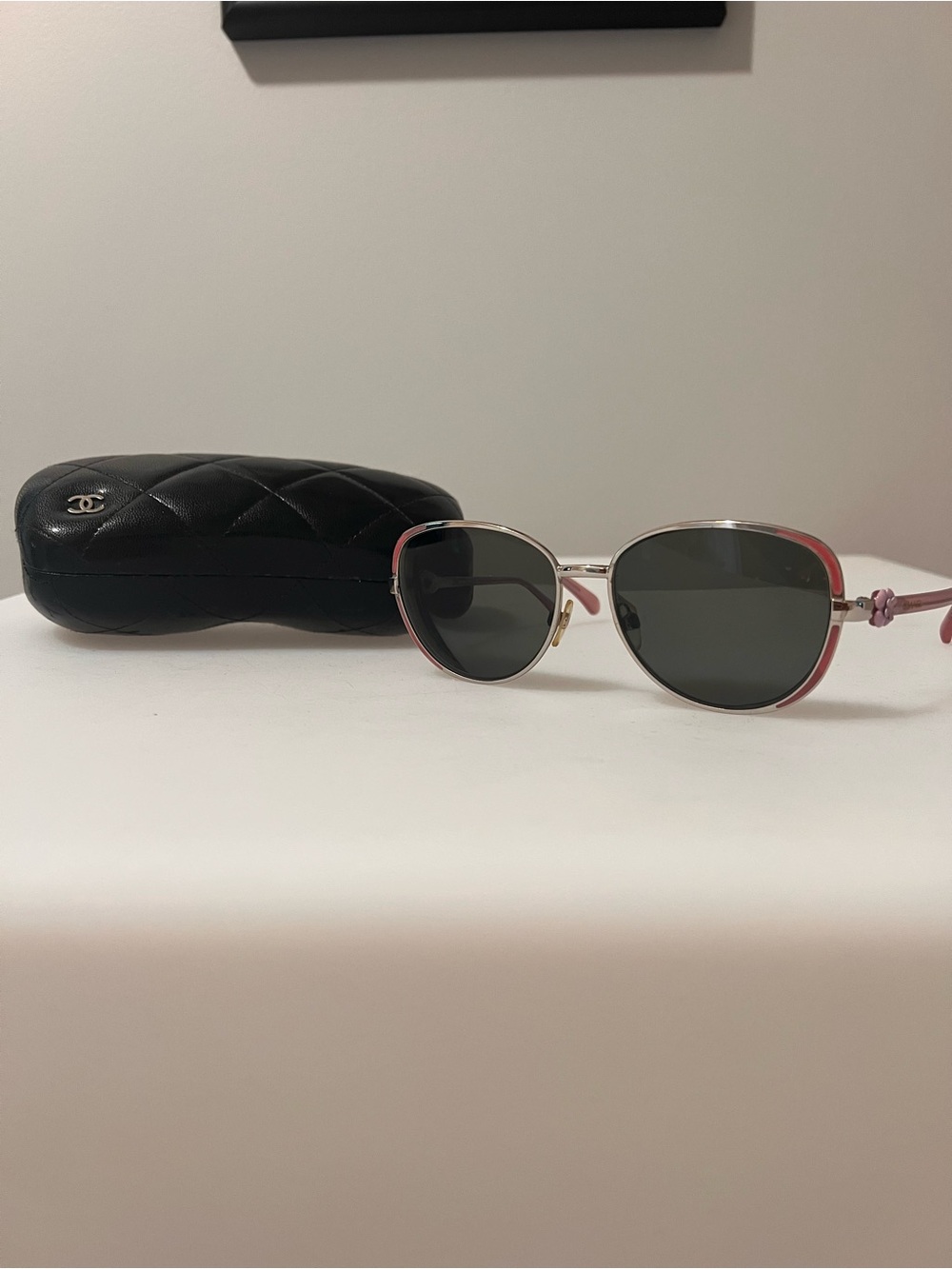 CHANEL Silver Frame Sunglasses with Pink Accents and Dark Lenses